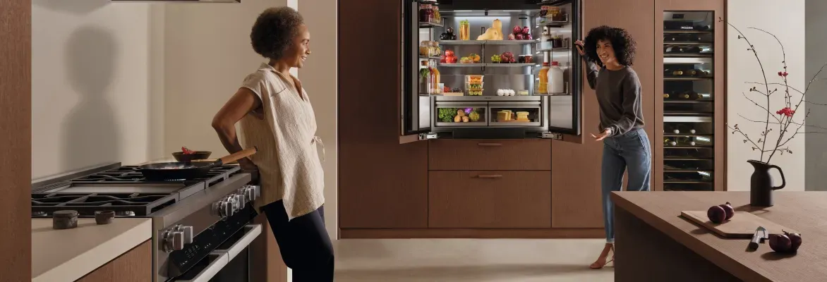 women-stainding-in-miele-luxury-kitchen